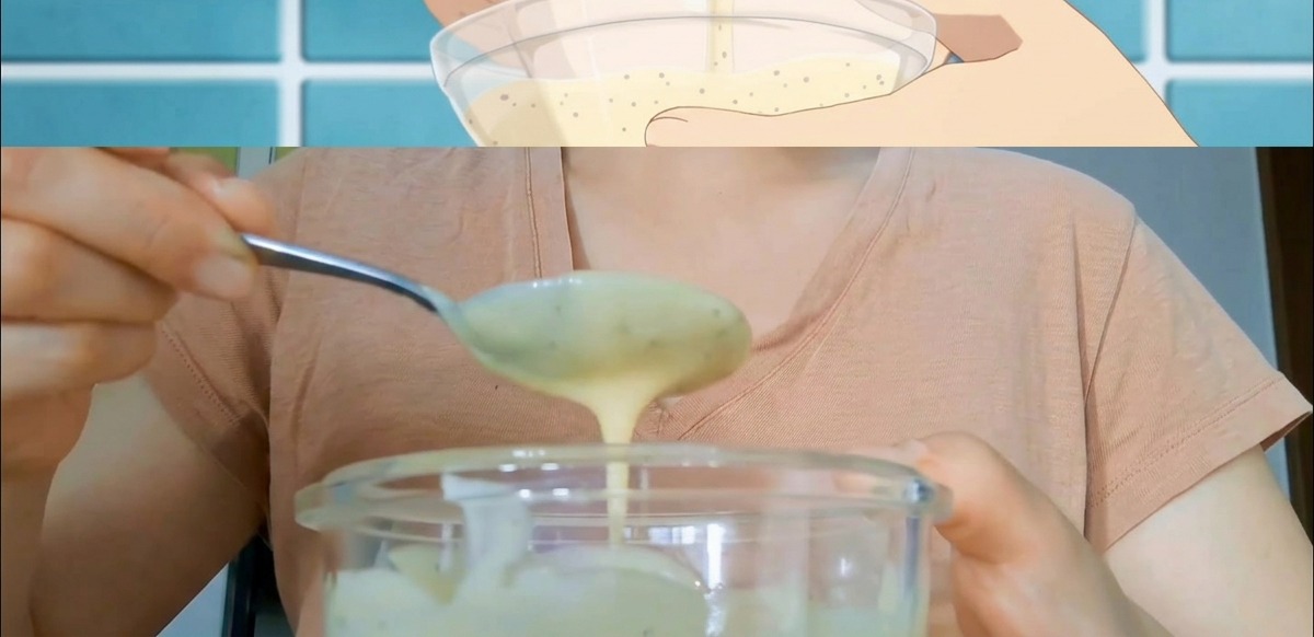 Mani che mescolano una salsa cremosa e puntinata in una ciotola di vetro con un cucchiaio.
